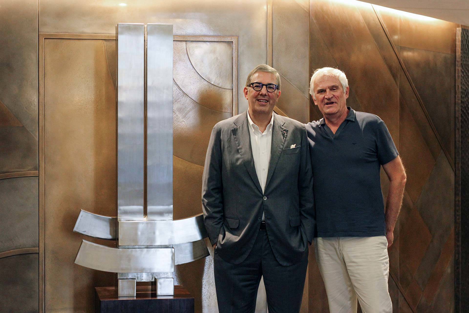 Claudio Marzocco (left) and Didier Viltart beside the Marino di Teana's artwork.